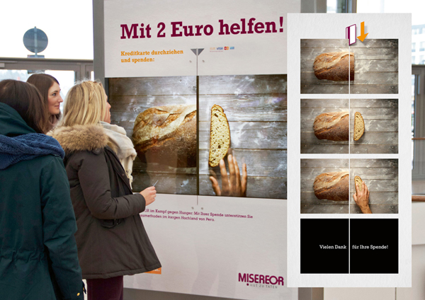Eine Kreditkarte, ein interaktives Plakat, zwei Euro – Was hat es damit auf sich?
